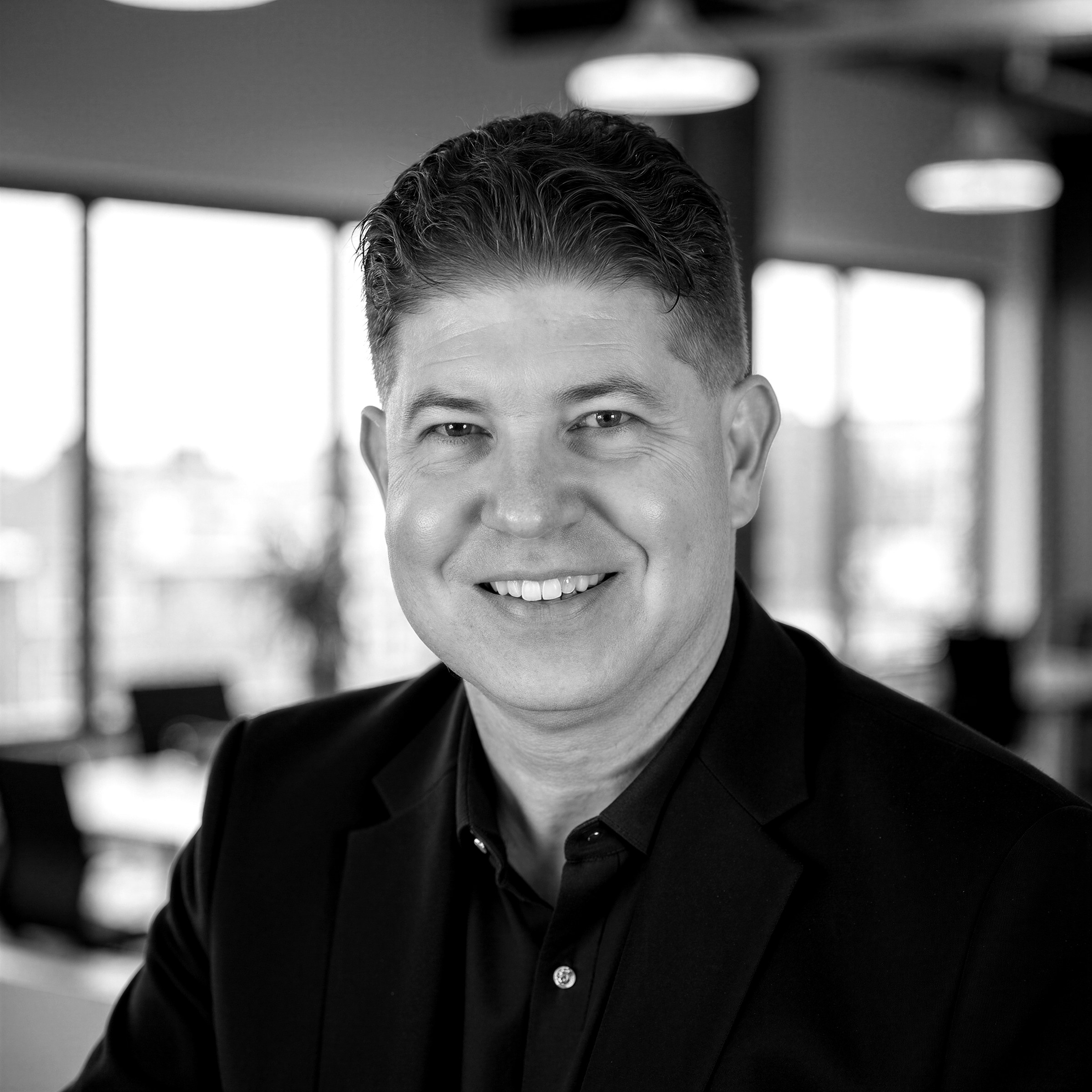Mike Barefoot headshot, black and white